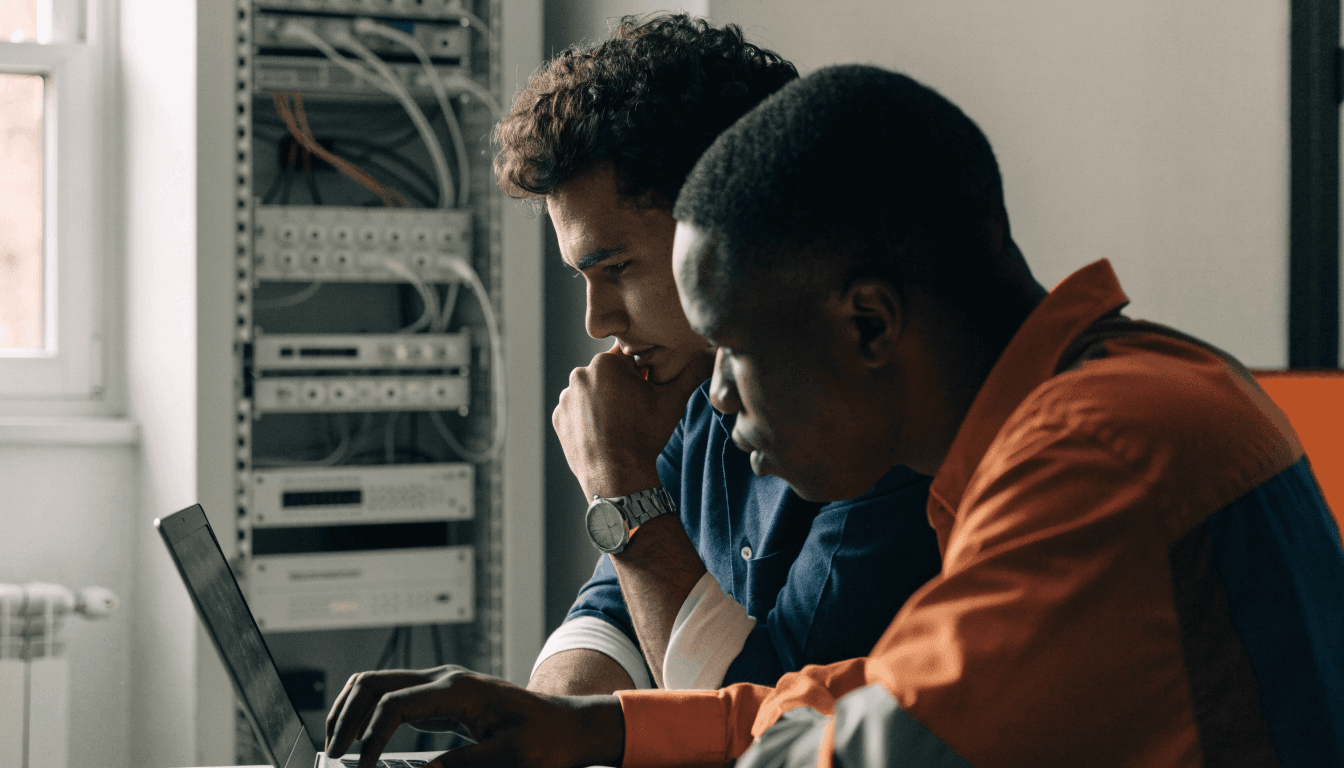 Small business owner comparing what is co-managed IT against in-house and fully outsourced IT